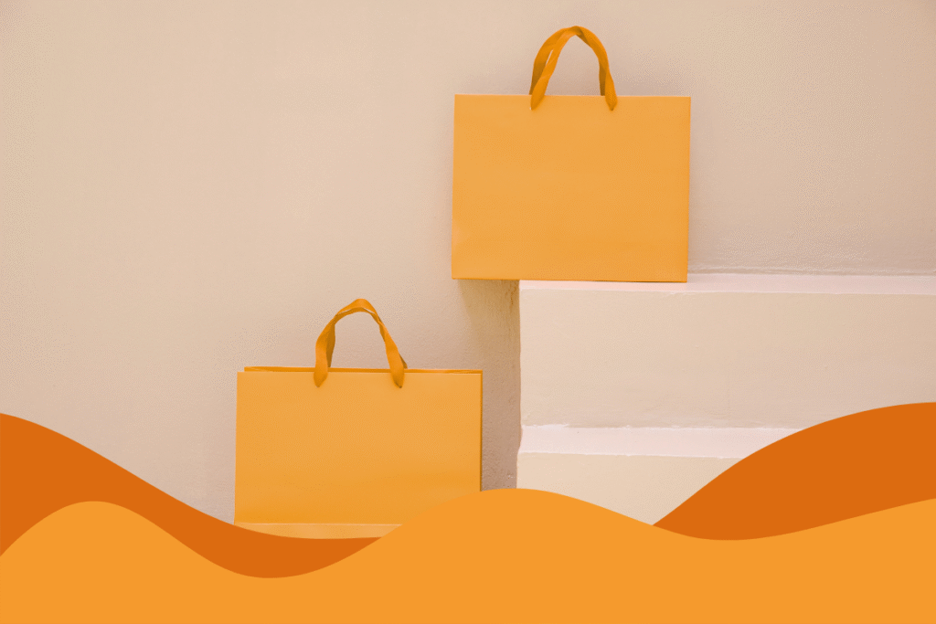 Orange shopping bags representing the Marks & Spencer 2025 cyberattack and its impact on businesses.