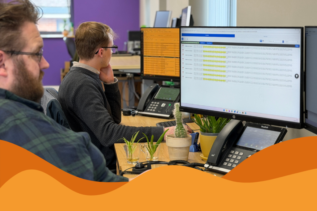 Image of two staff members at Daffodil IT working at their desks in an article about it support Sheffield for architecture firms by Daffodil IT in Sheffield