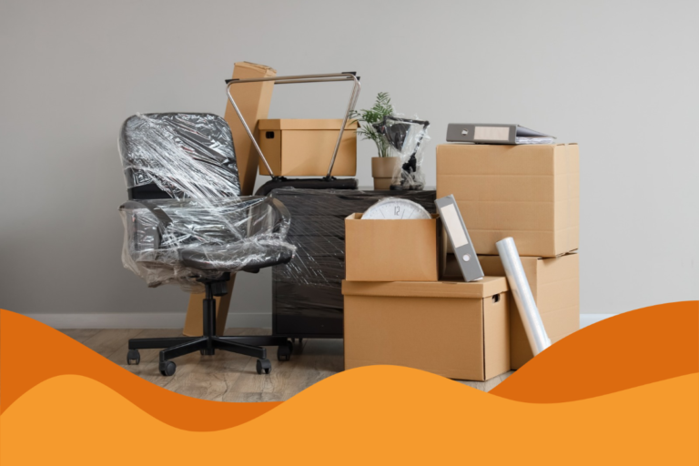 Image of an office chair and other equipment in boxes ready to move to a new office in an article about opening a second office and why your business needs the right IT support by Daffodil IT in Sheffield, South Yorkshire.